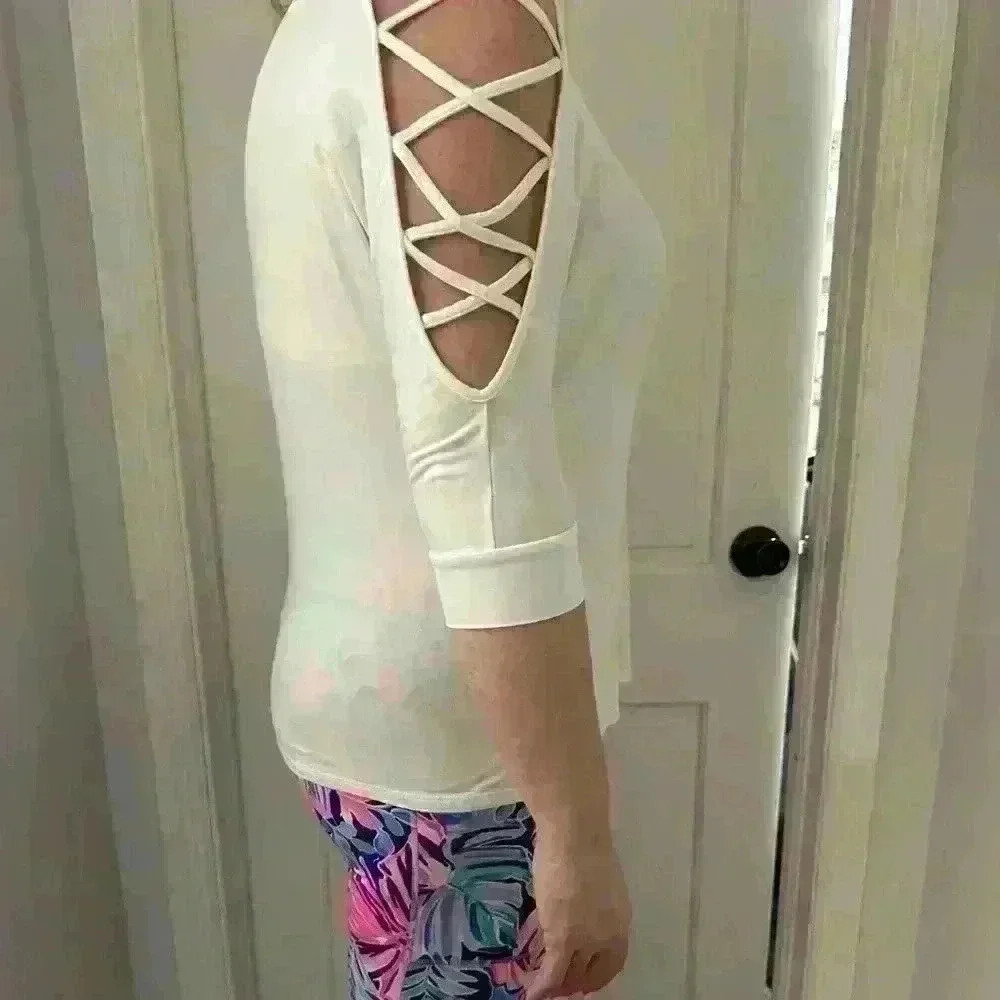 Molly & Isadora 1X off white top with sleeve cutouts Item# 3O